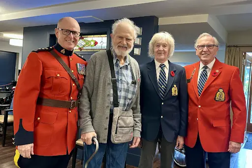 Pension (1) Victoria Division Vets visiting with a fellow Veteran at a Victoria seniors' residence on Remembrance Day 2024<br />